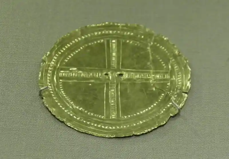 Gold sheet, solar disc, sun disc, solar cross